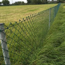 Chainlink fence installed around a field