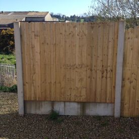 Concrete and wood panel fencing 